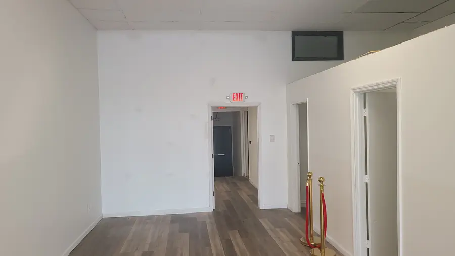 The queue stanchions were up before the room around them was finished