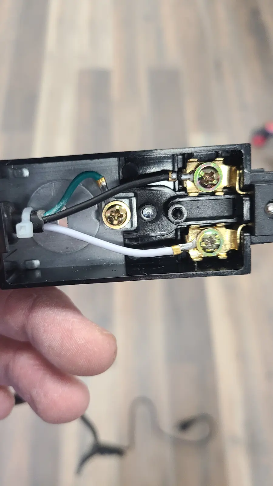 Wiring an outlet by hand — the details nobody sees